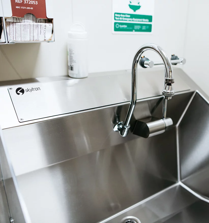 Skytron Stainless Steel sink installed in medical setting close-up