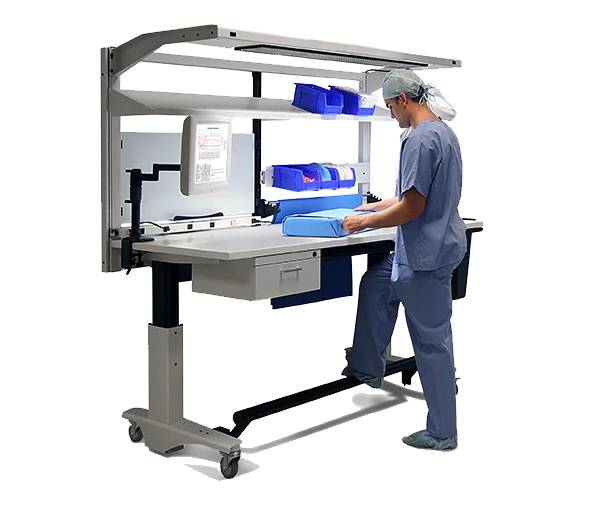 Skytron ErgoStat Prep & Pack Workstation in use by medical personnel in scrubs, no background