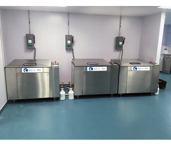 Three Skytron Flex Ultrasonic Washer Disinfectors side by side in medical setting